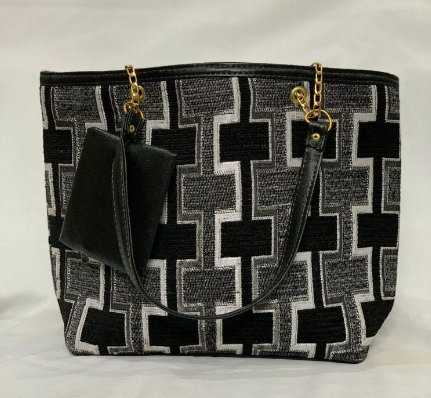 Women's raxine hand bag